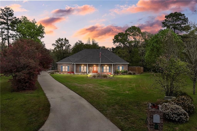 7180 Cannon Ball Cir, Bay Minette, AL 36507 - view of front of home featuring driveway and a front lawn