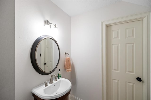 7180 Cannon Ball Cir, Bay Minette, AL 36507 - bathroom featuring baseboards and a sink
