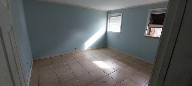 spare room with ornamental molding