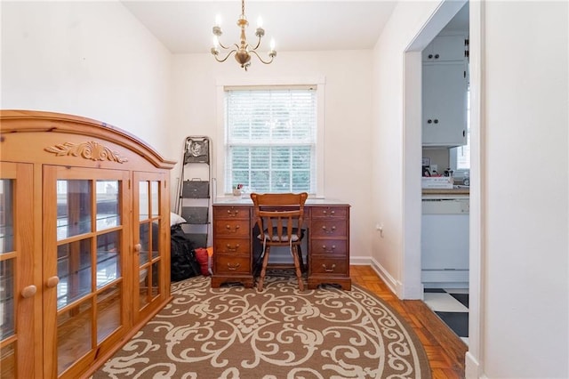 office space featuring hardwood / wood-style floors and a notable chandelier