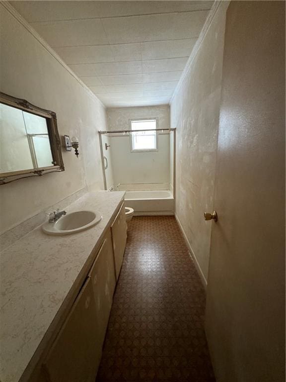 full bath featuring vanity, tile patterned floors, toilet, and ornamental molding