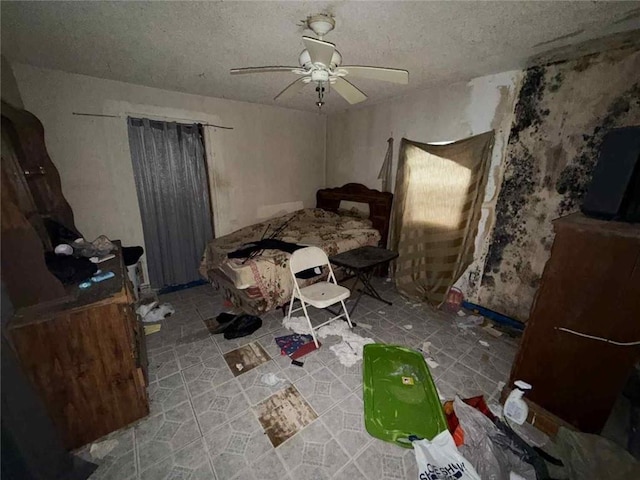 1320 Jessie St, Mobile, AL 36617 - bedroom featuring a textured ceiling and a ceiling fan