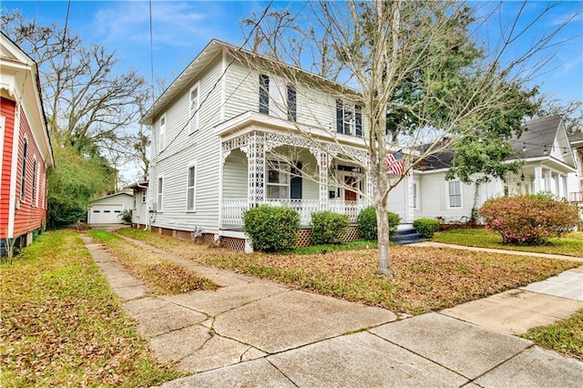 view of front of home featuring driveway and covered porch