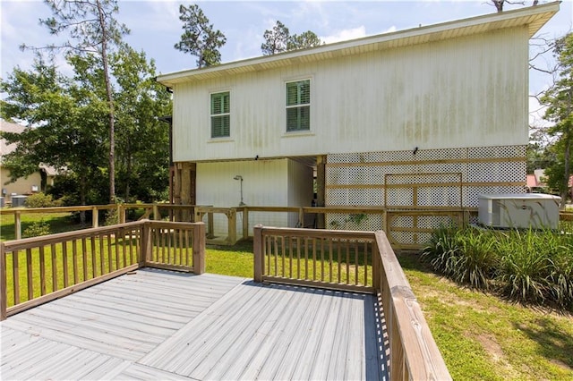 908 Longfellow Pl, Dauphin Island, AL 36528 - wooden deck with central AC unit and a yard