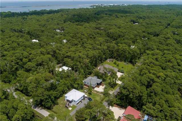 908 Longfellow Pl, Dauphin Island, AL 36528 - aerial overview of property's location featuring a heavily wooded area and a large body of water