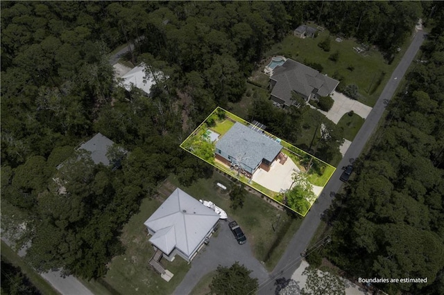 908 Longfellow Pl, Dauphin Island, AL 36528 - aerial view of property's location with property parcel outlined and a forest
