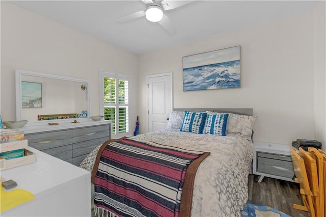 908 Longfellow Pl, Dauphin Island, AL 36528 - bedroom with wood finished floors and ceiling fan
