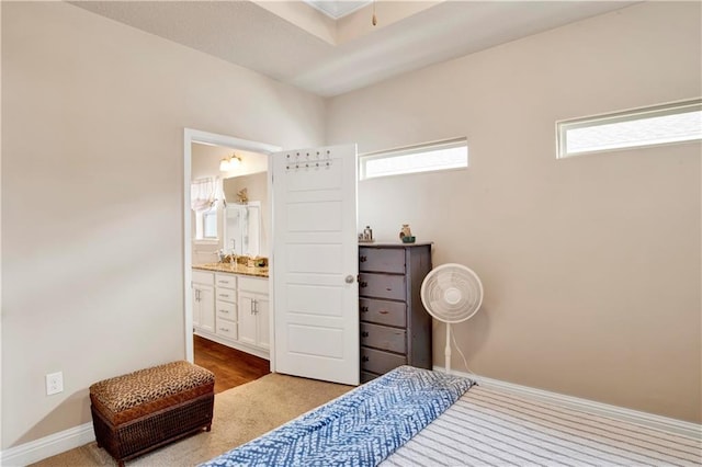 bedroom featuring ensuite bath