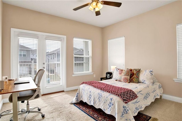 carpeted bedroom featuring ceiling fan and access to outside