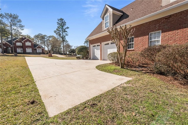 view of yard featuring a garage