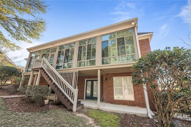 back of house with a patio area