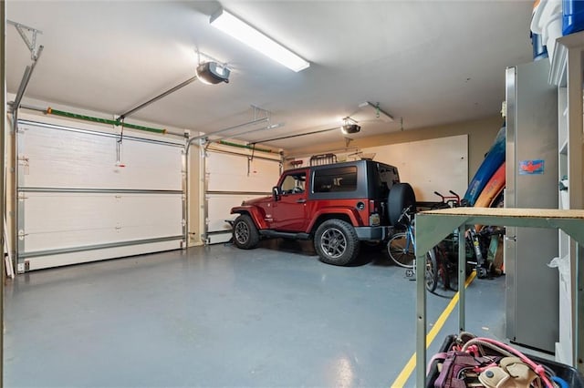 4008 Mcgregor Oaks, Mobile, AL 36608 - garage featuring a garage door opener