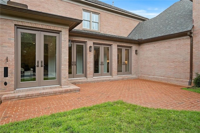 4008 Mcgregor Oaks, Mobile, AL 36608 - rear view of property featuring french doors, brick siding, and roof with shingles