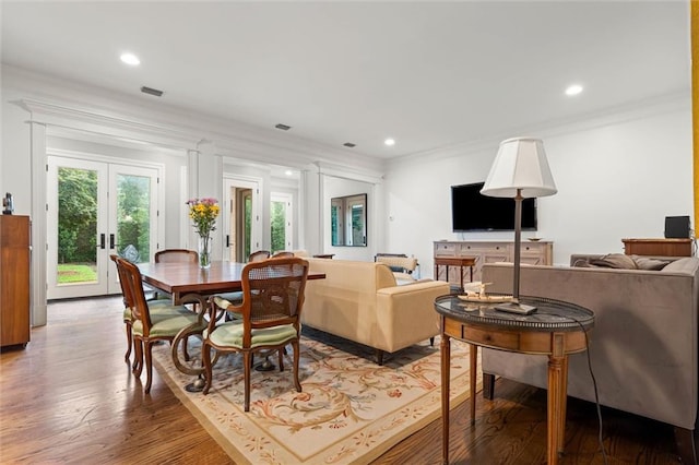 4008 Mcgregor Oaks, Mobile, AL 36608 - living room with ornamental molding, healthy amount of natural light, light wood-style floors, recessed lighting, and french doors