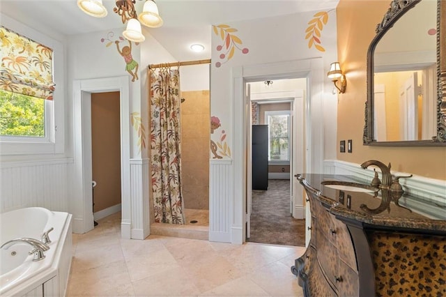 251 Georgia Ave S, Mobile, AL 36604 - full bathroom featuring vanity, a stall shower, a whirlpool tub, and plenty of natural light