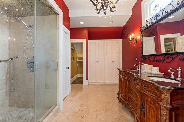 251 Georgia Ave S, Mobile, AL 36604 - full bath featuring a shower stall, an inviting chandelier, a sink, and double vanity