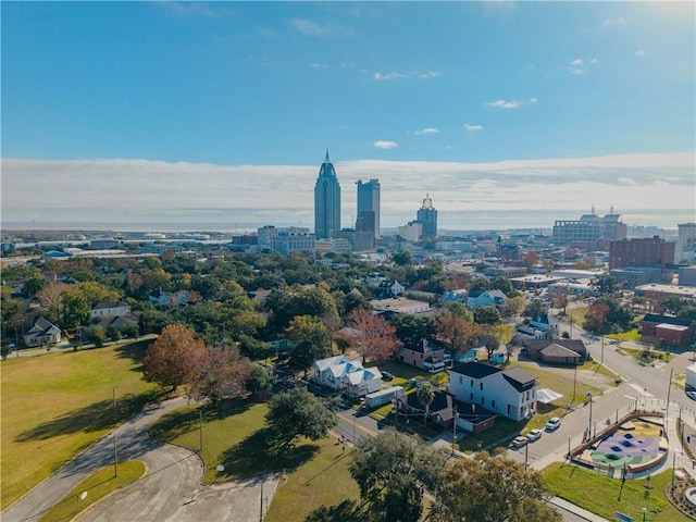 birds eye view of property with a view of city