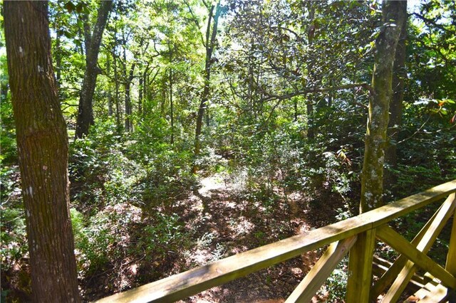 view of local wilderness with a view of trees