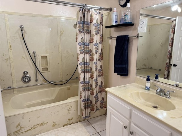 bathroom featuring tile patterned flooring, vanity, and shower / bath combo with shower curtain