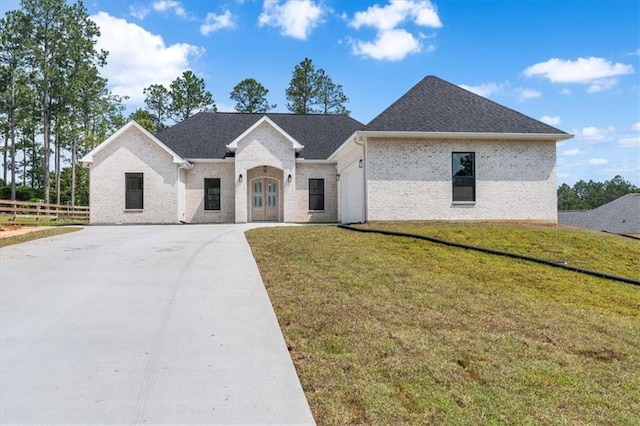 view of front of home with a front yard