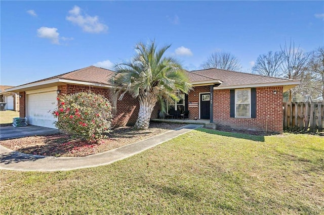 ranch-style home featuring driveway, an attached garage, fence, a front yard, and brick siding