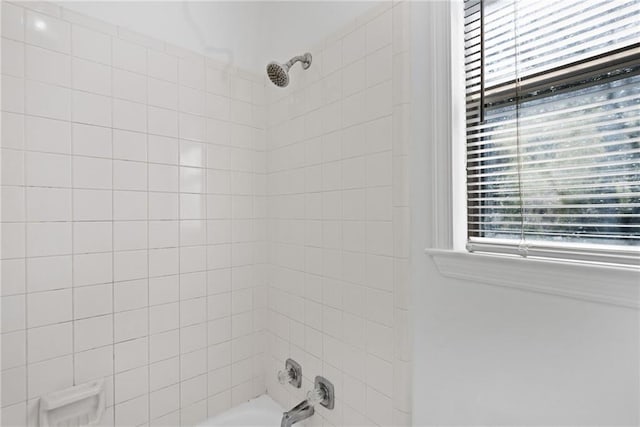 bathroom with shower / bath combination