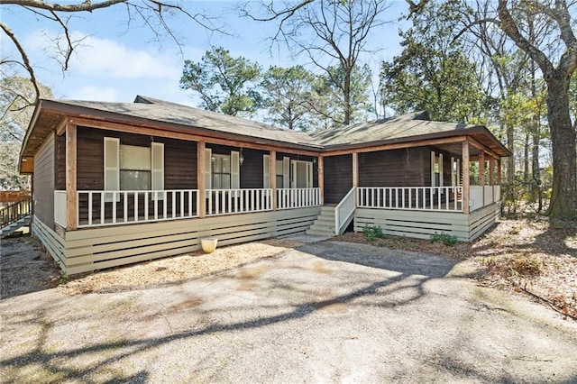 view of front of property featuring covered porch