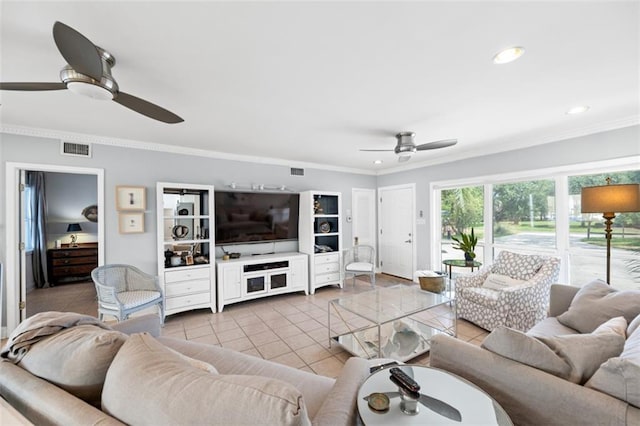 living area featuring ceiling fan, recessed lighting, visible vents, ornamental molding, and tile patterned floors