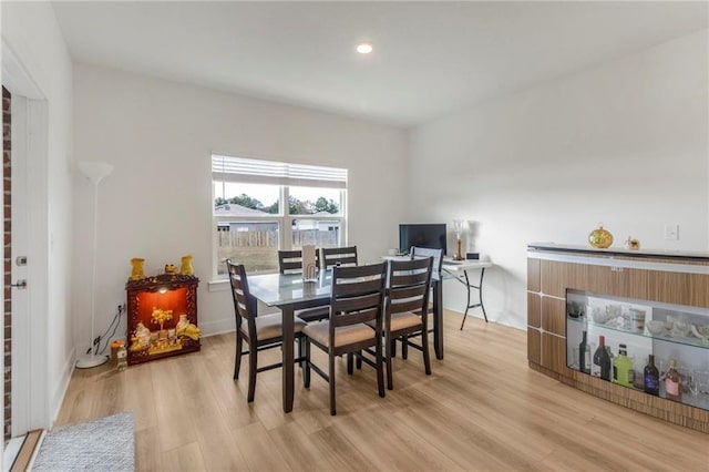 dining space featuring light hardwood / wood-style flooring