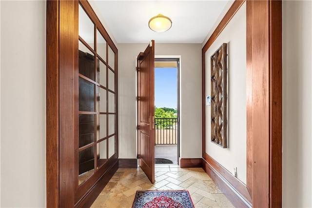 18269 Colony Dr Unit 405, Fairhope, AL 36532 - entryway with baseboards and stone tile flooring