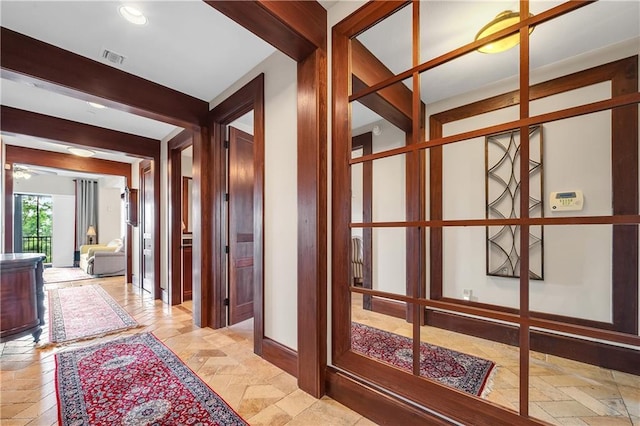 18269 Colony Dr Unit 405, Fairhope, AL 36532 - hallway featuring stone tile flooring and recessed lighting