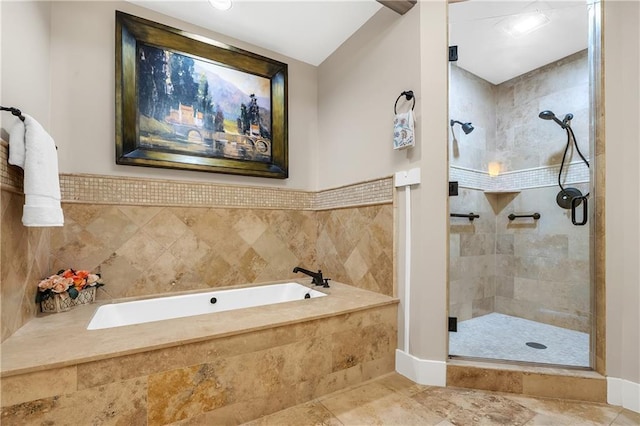 18269 Colony Dr Unit 405, Fairhope, AL 36532 - bathroom featuring a garden tub and a stall shower