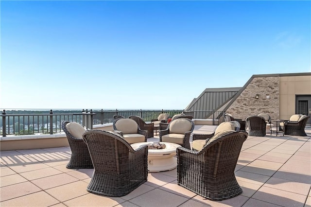 18269 Colony Dr Unit 405, Fairhope, AL 36532 - view of patio with an outdoor living space with a fire pit