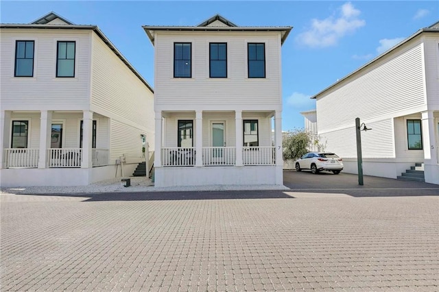 view of property with covered porch