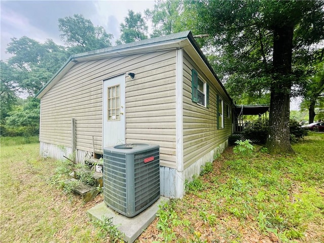 view of outdoor structure with central AC unit