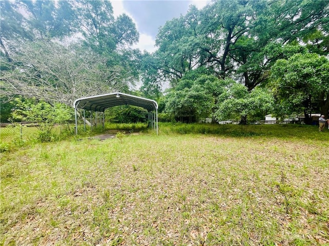 view of yard with a carport