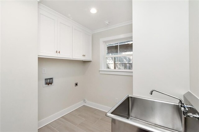 laundry room with cabinet space, baseboards, hookup for a washing machine, hookup for an electric dryer, and recessed lighting