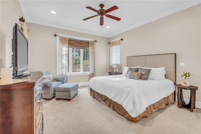 bedroom with recessed lighting, ornamental molding, light carpet, ceiling fan, and baseboards