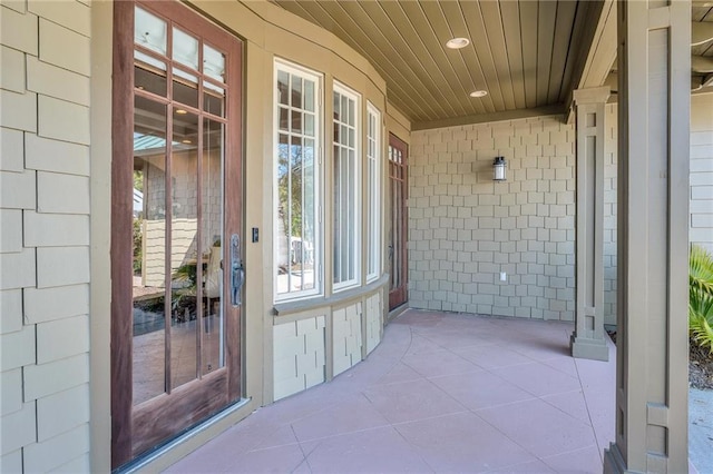 property entrance featuring covered porch