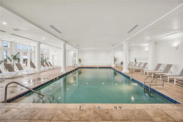 community pool featuring decorative columns