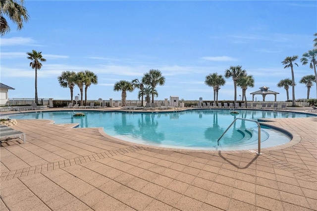 pool featuring a gazebo and a patio area