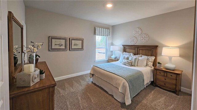 bedroom featuring baseboards, carpet flooring, and recessed lighting