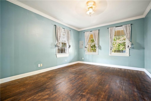 unfurnished room with hardwood / wood-style floors, ornamental molding, and ceiling fan