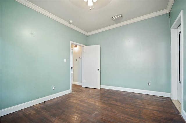 empty room with dark wood-type flooring, ceiling fan, and ornamental molding