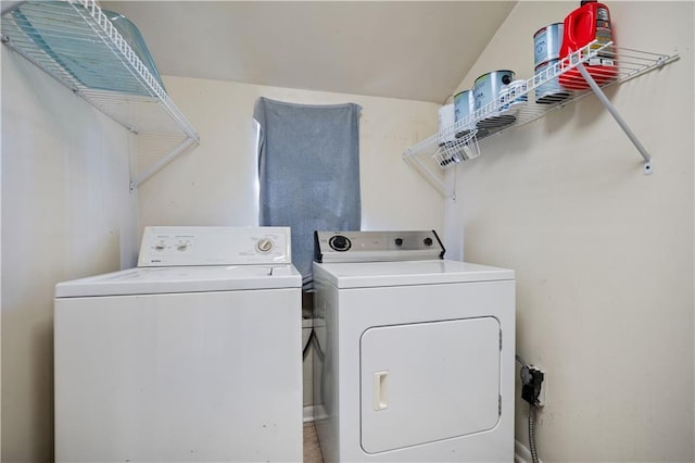 laundry area with separate washer and dryer