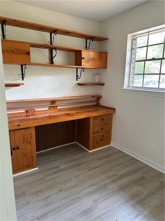 315 Thunderbird Dr, Satsuma, AL 36572 - unfurnished office featuring light wood finished floors and baseboards