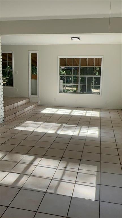 315 Thunderbird Dr, Satsuma, AL 36572 - unfurnished room featuring light tile patterned floors