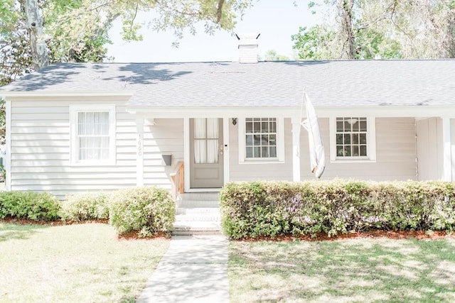 1660 Old Shell Rd, Mobile, AL 36604 - single story home featuring a chimney and roof with shingles