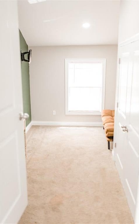 1660 Old Shell Rd, Mobile, AL 36604 - empty room featuring light carpet and baseboards