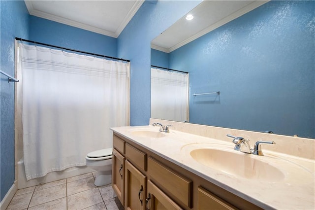 bathroom featuring a sink, toilet, and crown molding